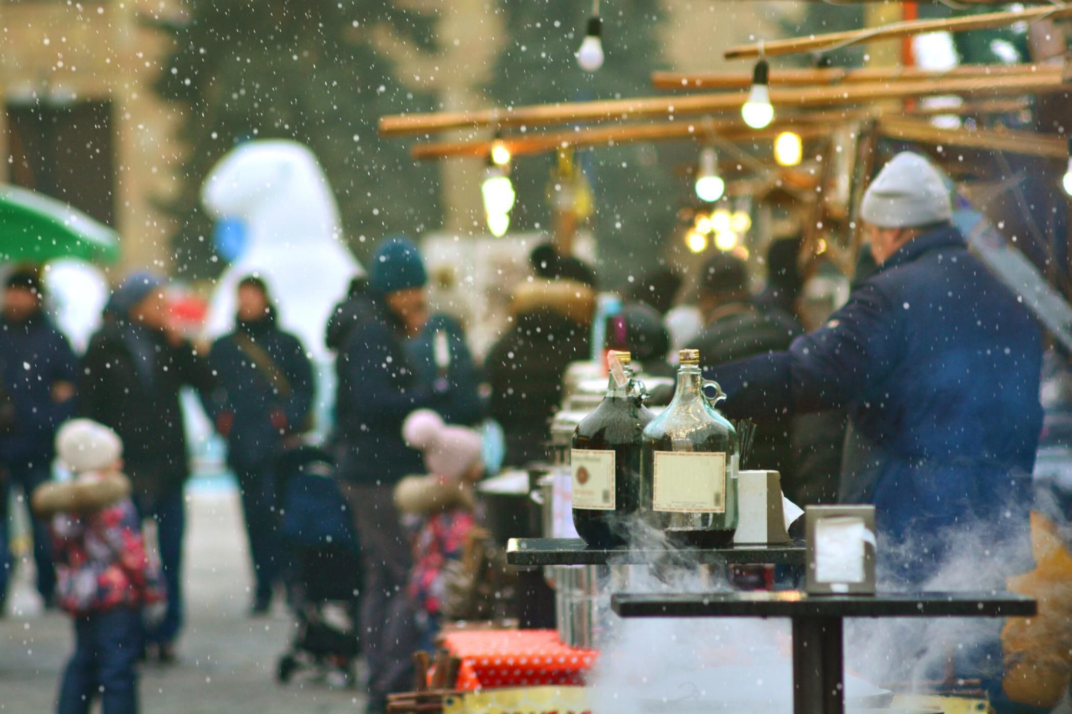 Street food, winter cityscape background. Blurred.